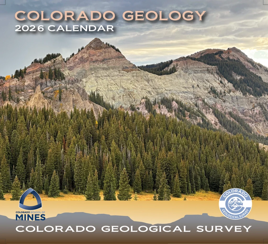 Mountain with a varicolored, striped appearance, surrounded by evergreen forest. Cover of the 2026 CGS Geology Calendar. Porcupine Cone, West Elk Wilderness, Gunnison County. Photo credit: Andrew Giebel (CGS).