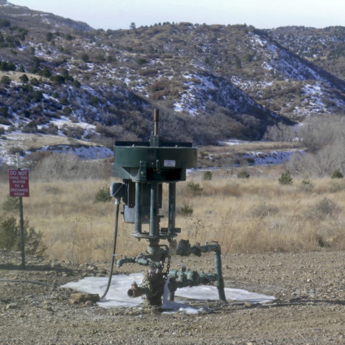Coalbed methane wellhead, Raton Basin, Las Animas County, December 2003. Photo credit: Chris Carroll for the CGS.
