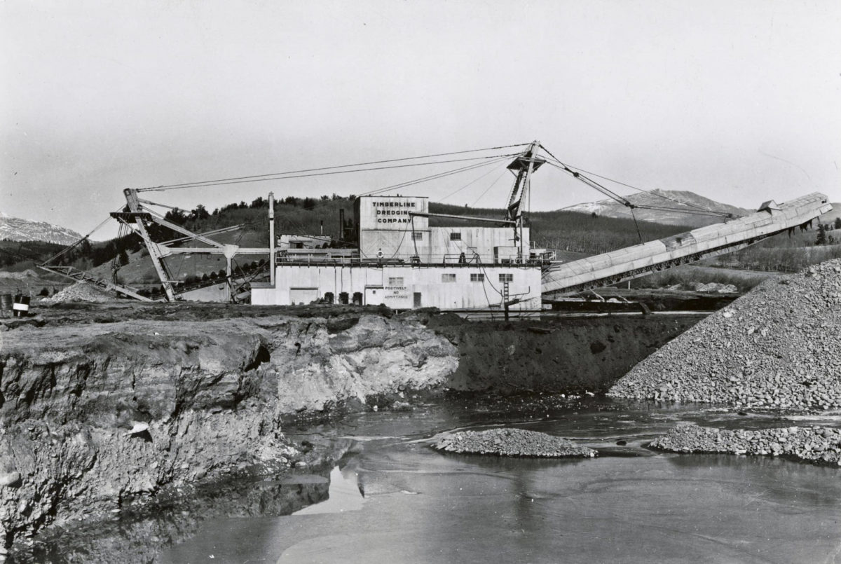 Placer gold mining dredge on the South Platte River near Fairplay, Colorado, November 1939. Photo credit: Jay Higgins.