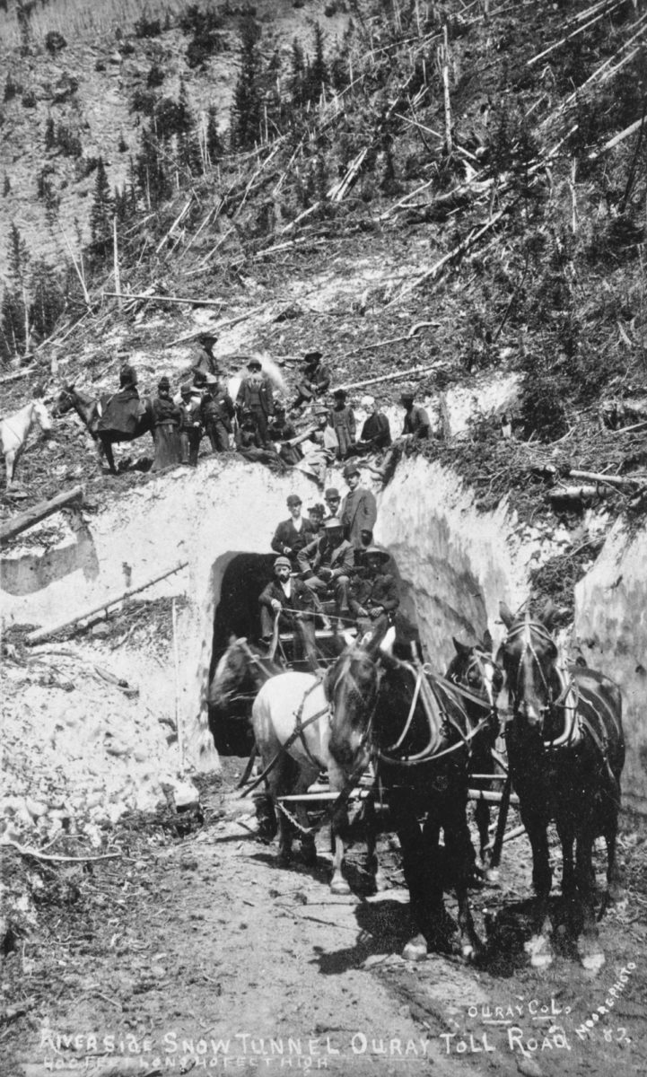 Stage on Ouray-Red Mountain toll road tunneled through previous years' avalanche. Road used to haul ore from mining section to mills. Ouray County, Colorado, August 1882. Photo credit: Library of Congress
