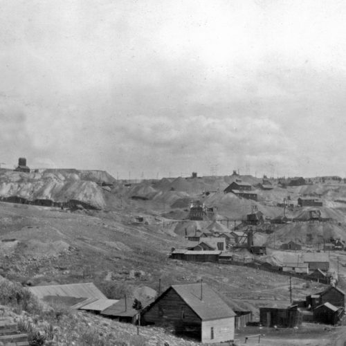 The Wolftone and neighboring mines. Looking southward from track near head of Seventh Street, Leadville, Lake County, Colorado, 1913. Photo credit: G.F. Loughlin.