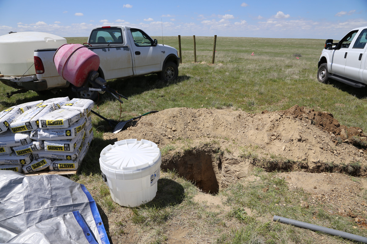 Trenching for the seismometer pit with the weather-and-critter-proof housing, Briggsdale, Colorado, May 2016. Photo credit: Mike Bornowski for the CGS.