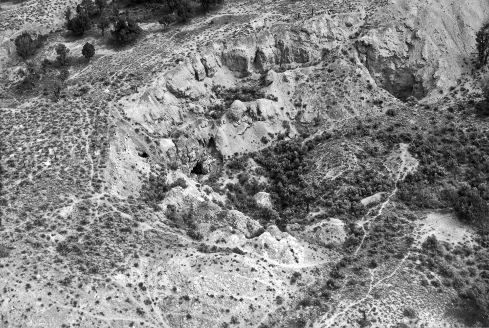 Figure 04. A large sinkhole approximately 200 ft (60 m) in diameter in the Eagle Valley Evaporite near the Eagle County Airport outside of Gypsum, Colorado. Photo credit: Colorado Geological Survey.