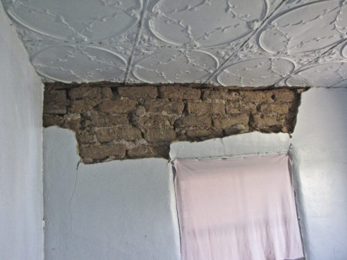 Earthquake damage: to interior adobe walls of residence, Trinidad, Colorado, August 2011. Photo credit: T.C. Wait for the CGS.