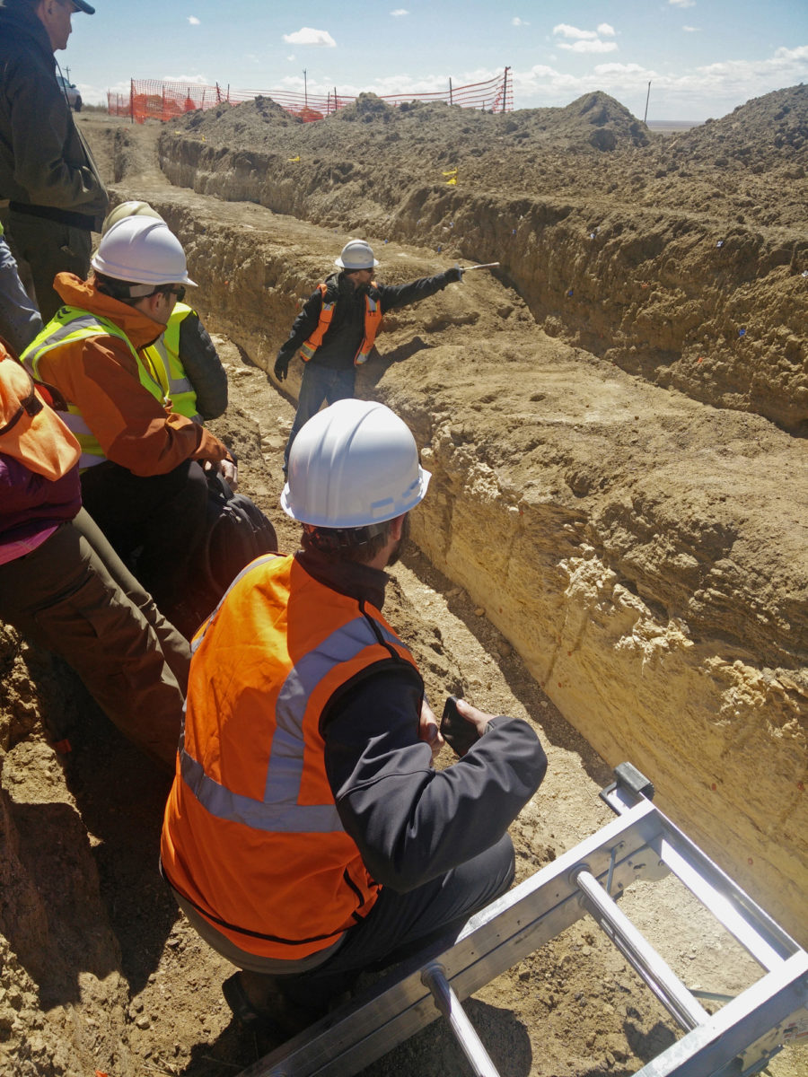 Researchers examining the 2016 trench near Haswell, Colorado. Photo credit: Matt Morgan for the CGS.