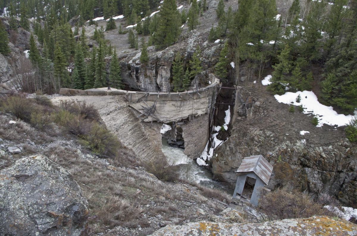 The remains of the Hidden Treasure dam across Henson Creek. The dam catastrophically burst in 1973. It originally supplied electric power to the Ute-Ulay mine facility in Hinsdale County, Colorado, April 2019. Photo credit: Jon Lovekin for the CGS.