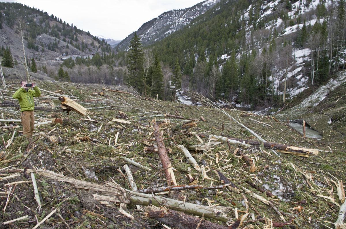 Standing on the detritus of an historically large avalanche along Henson Creek in Hinsdale County, Colorado, April 2019. Photo credit: Jon Lovekin for the CGS.