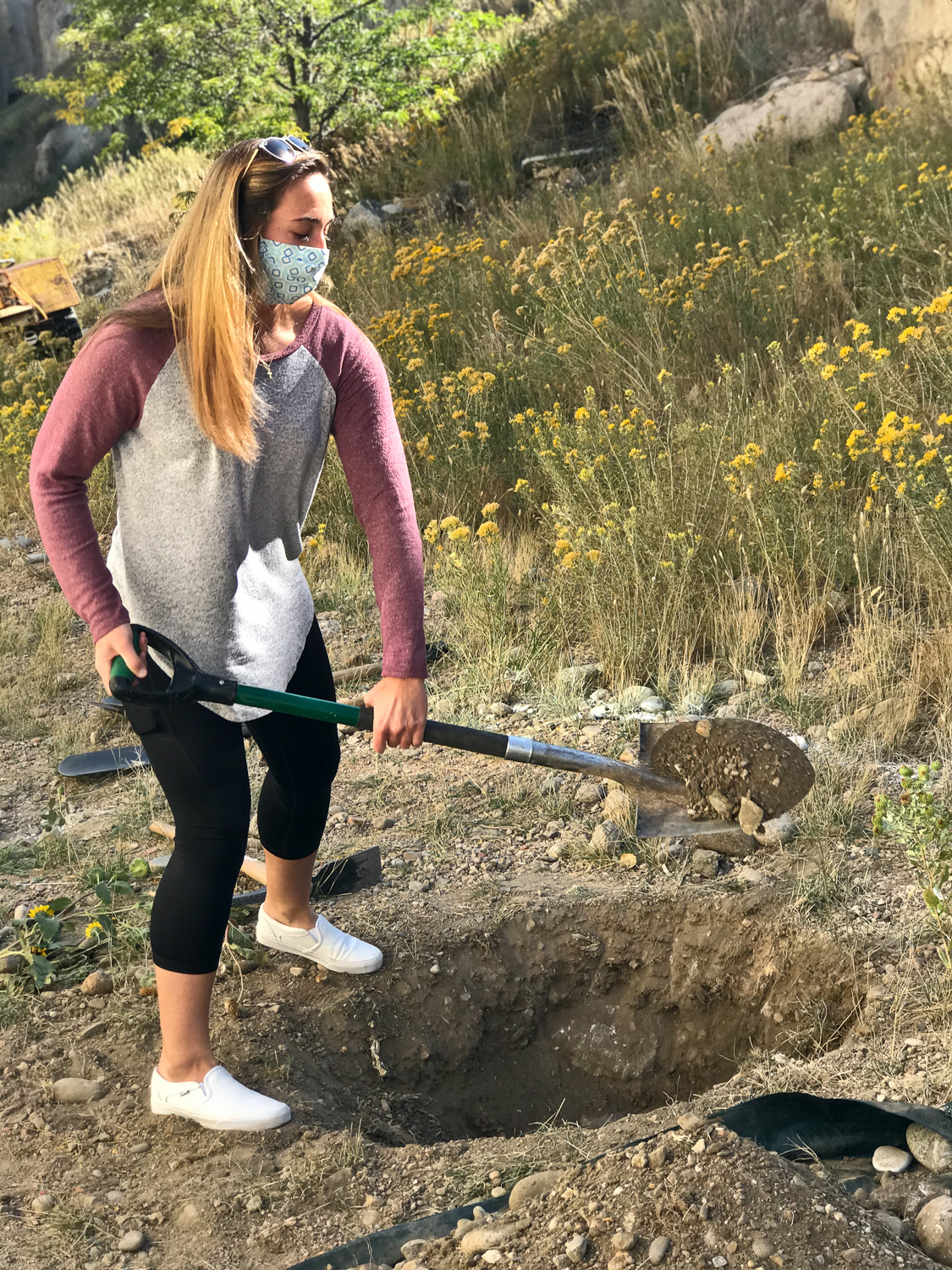 Rachel Willis, Mines student, continues the excavation in some very hard backfill. Photo credit: Ebru Bozdag.