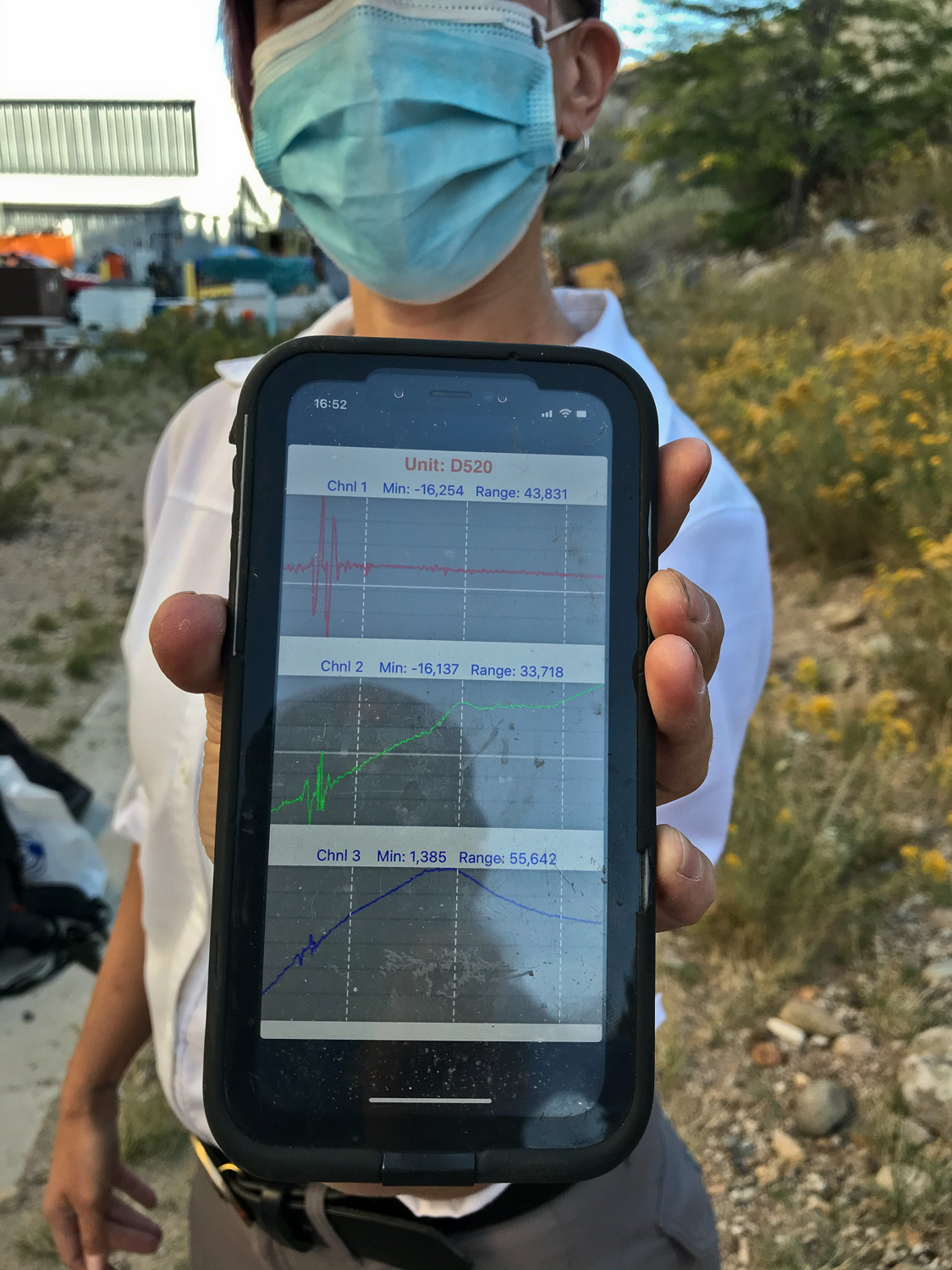Kyren Bogolub shows an initial seismic trace from the installation. The seismometer will be recording ground movement continuously for several weeks, providing data for class analysis and interpretation. Photo credit: Ebru Bozdag.