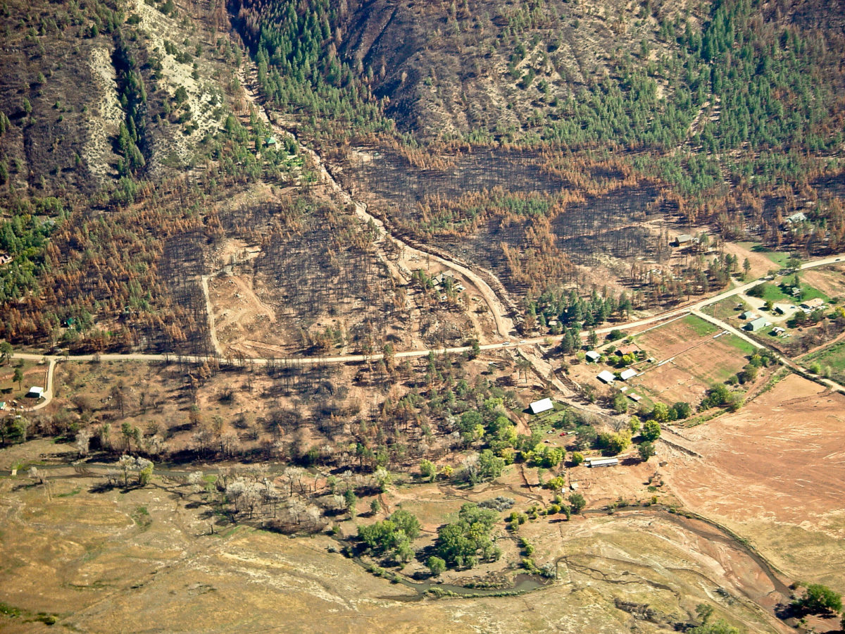 An alluvial fan with fire damage exiting Kroeger Canyon after the Missionary Ridge fire near Durango, September 2002. Photo credit: Dave Noe for the CGS.