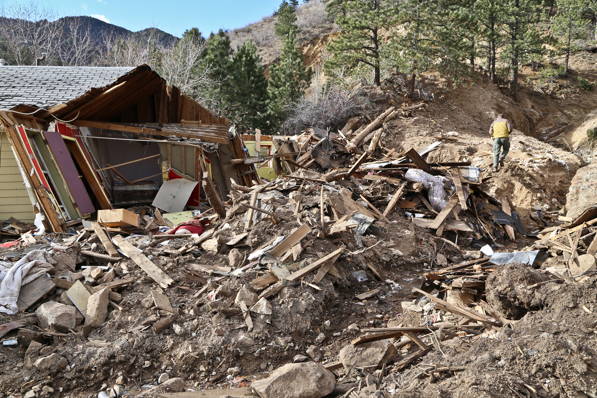 House destroyed by debris flow, after the “1,000-year rain event” in September near Jamestown, Colorado, November 2013. Photo credit: Jon White for the CGS.