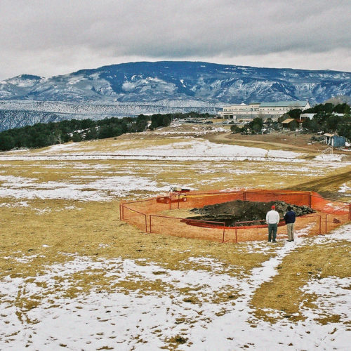 West view of the 2003 sinkhole showing proximity to campus buildings. Sunlight Ski Area is on the left horizon. Roaring Fork River valley is in left middle background below the ski area and in front of first row of ridges. Photo credit: Jon White for the CGS.