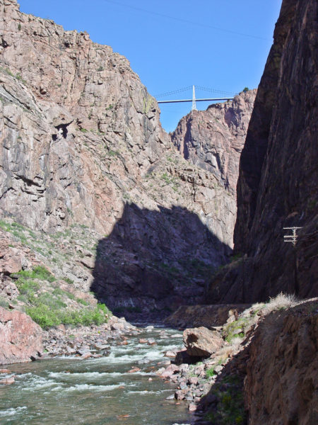 View of the Royal Gorge Bridge spanning the Precambrian walls, from the bottom of the Gorge. Photo credit: Vince Matthews for the CGS.