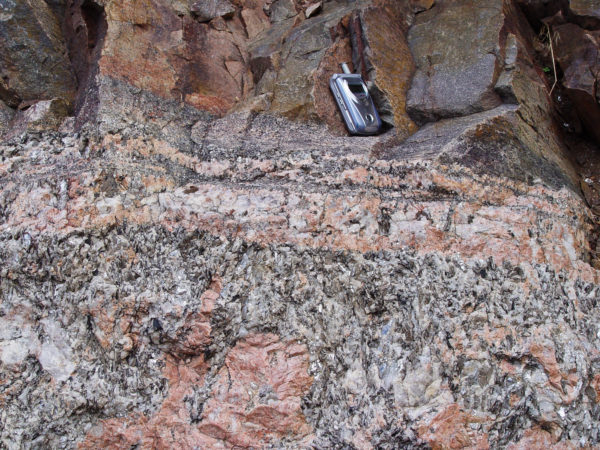 Pegmatite vein exposed in the Precambrian rocks cut through by the Royal Gorge of the Arkansas River. Photo credit: Vince Matthews for the CGS.