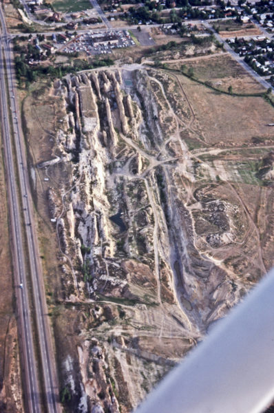 The claypits immediately south of the CSM campus along US 6 in 1977 before more recent reclamation as a golf course. The green area to the top left is the IM field where the subsidence occurred. Photo credit: Colorado Geological Survey.