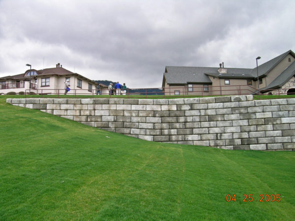 Retaining wall settlement at the center of the image with the sorority houses in the background and the IM field in the foreground. Photo credit: T. C. Wait for the CGS.