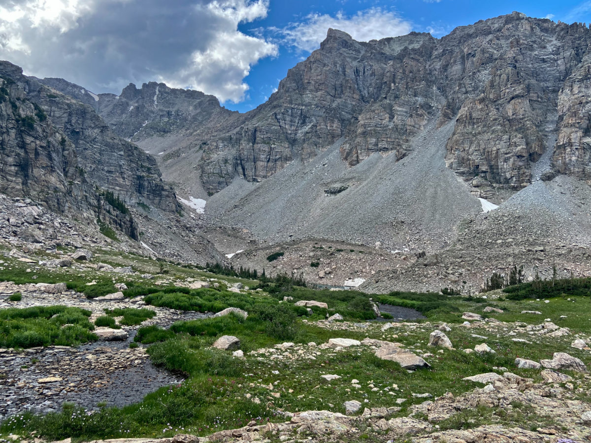 The rugged Elk Tooth (12,848 ft / 3916 m) in the Indian Peaks Wilderness surrounds the smaller Saint Vrain glaciers which form the headwaters of the Saint Vrain River in northern Boulder County. Photo credit: Kyren Bogolub.